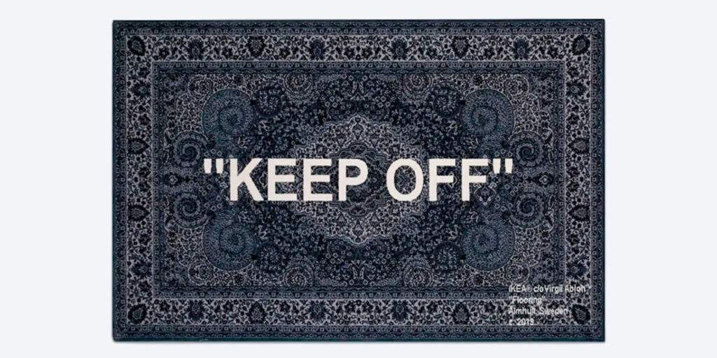 View of the Virgil Abloh's KEEP OFF IKEA rug on display at an