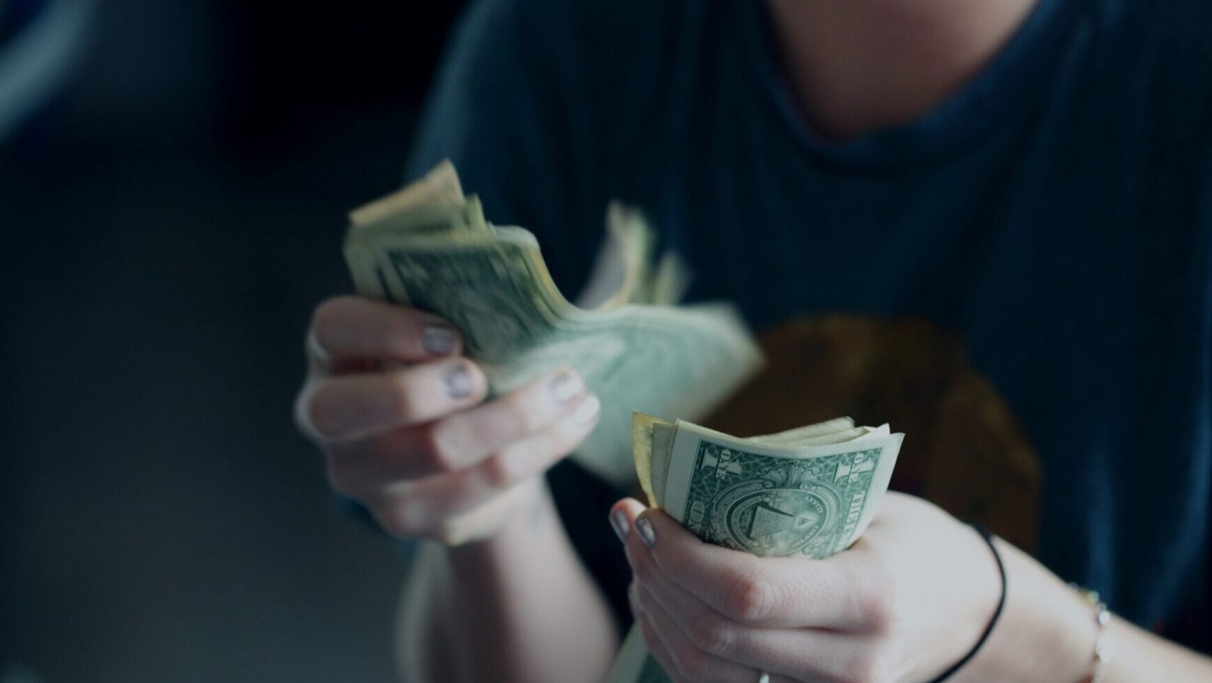 Reseller holding cash