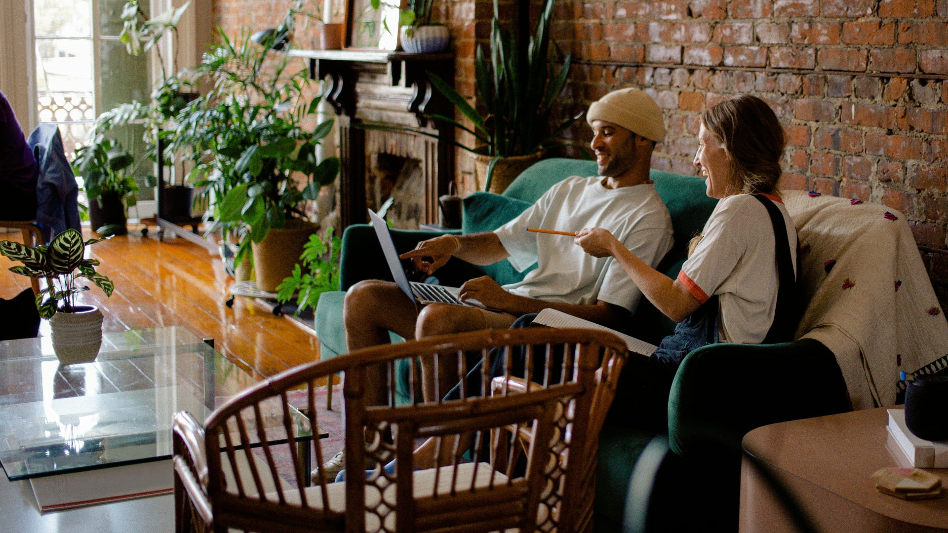 Man and woman setting up an eBay seller account