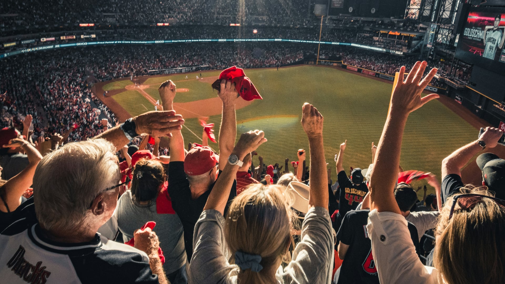 Baseball fans attending a free MLB game